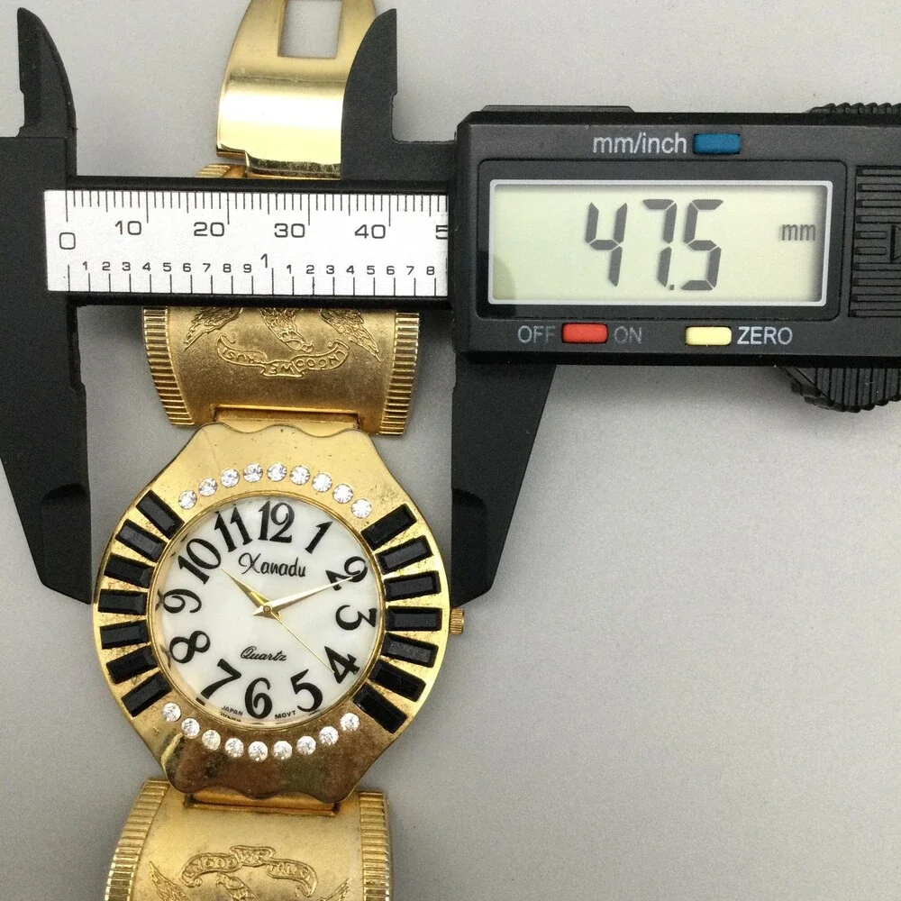 Xanadu Womens Watch 48mm Gold Tone Eagle Cuff Crystal Bezel New Battery 6.5